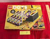 Front of sealed LEGO DOTS 41960 box with ruler for scale