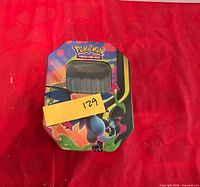 Closed Pokémon tin showing exterior artwork