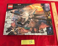 Front of sealed Lego 76186 box showing set artwork, piece count and minifigures
