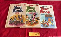 Front covers of all three Disney Year Books 1988-1990