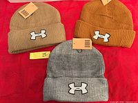 Overview of all three Under Armour knit hats