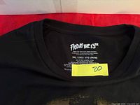 Neck label showing Friday the 13th branding and 3XL size