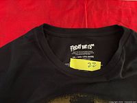 Neck label showing Friday the 13th branding and 3XL size