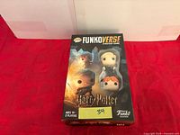 Front of sealed Funkoverse Harry Potter board game box