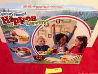 Front of sealed Hungry Hungry Hippos Launchers game box