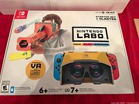 Front of Nintendo Labo VR Kit Starter Set + Blaster box with age rating and VR goggles graphic