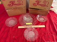 Group shot showing dinner plate, salad and bread plates, saucer, cup and Fantasia boxes
