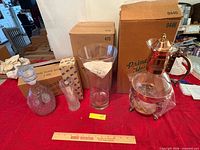 All four Princess House items with boxes and ruler for scale