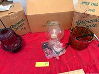 Group shot showing three Princess House candle holders and accessories