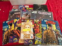 Overview of all comics and magazines spread on table