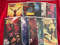 All ten Ultimate X-Men comics spread out, issue numbers visible