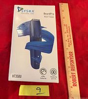 Front of sealed Syska BeardPro HT350U box with ruler for scale
