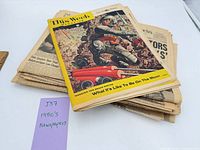 Stack with astronaut cover of This Week on top