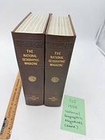 Two brown hardbound National Geographic Magazine volumes spine view