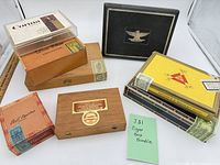 All eight cigar boxes together