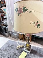 Full lamp with shade and cord visible