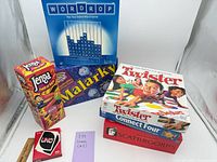 Group shot of all seven game boxes