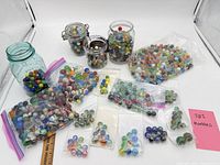 Overall lot with jars and bags of marbles