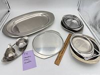 overview of all stainless pieces arranged on table