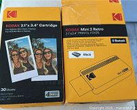 Front view of printer box and 30-sheet cartridge box