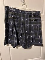 Front view of Ravenclaw plaid skirt showing pleats and buckle detail
