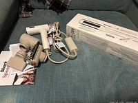 Overall view: hair dryer with attachments, Steampod box