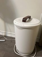 Full view of Sameat white barrel towel warmer with power cord