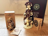 Both figurines with boxes and papers