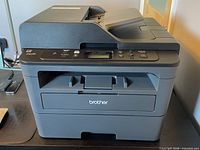 Front view of Brother DCP-L2550DW all-in-one laser printer