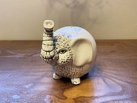 front view showing trunk and facial detail