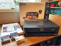 Printer with box, paper pack and three ink cartridges