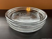 Stack of clear glass pie plates
