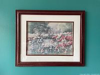 Front view of framed garden watercolour print on wall