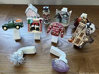 Eight assorted decorative Wallflowers plugs on table