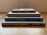 Spine view of four stacked beer books showing titles and authors