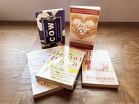 Front covers of all five books arranged face up