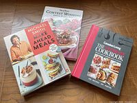 Group shot of three cookbooks showing fronts