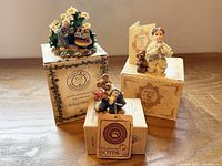 All three Boyds Bears figurines with their boxes