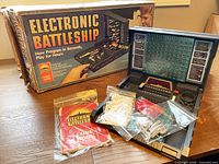 Front of box with opened console and bagged components