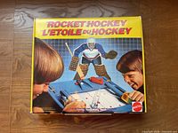 Box top showing Rocket Hockey branding and player illustration