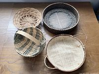 All four assorted wicker baskets displayed on table