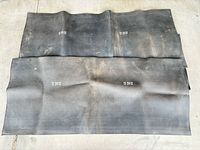 Two mats laid flat showing overall size and surface markings