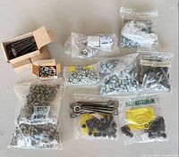 All packaged fasteners spread out to show quantity and variety