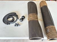 Overall lot showing two rolled sheets, balls, coiled strips