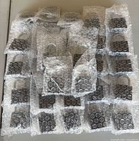 Stack of bubble-wrapped padlocks