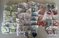 All bubble-wrapped heart padlocks grouped by color