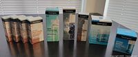 All nine boxed Neutrogena products lined up on table