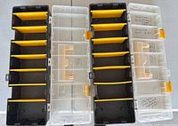 Top view of both organizers open showing yellow dividers inside and clear lids