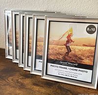 Front view of all six sealed silver frames