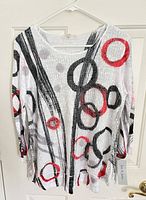 Front view of brand new Jess & Jane Bubbles top on hanger